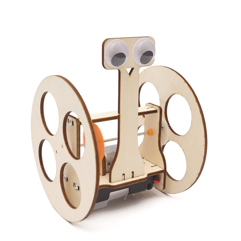 A wooden DIY balance robot car puzzle with a simplistic yet charming design featuring large eyes on the front.
